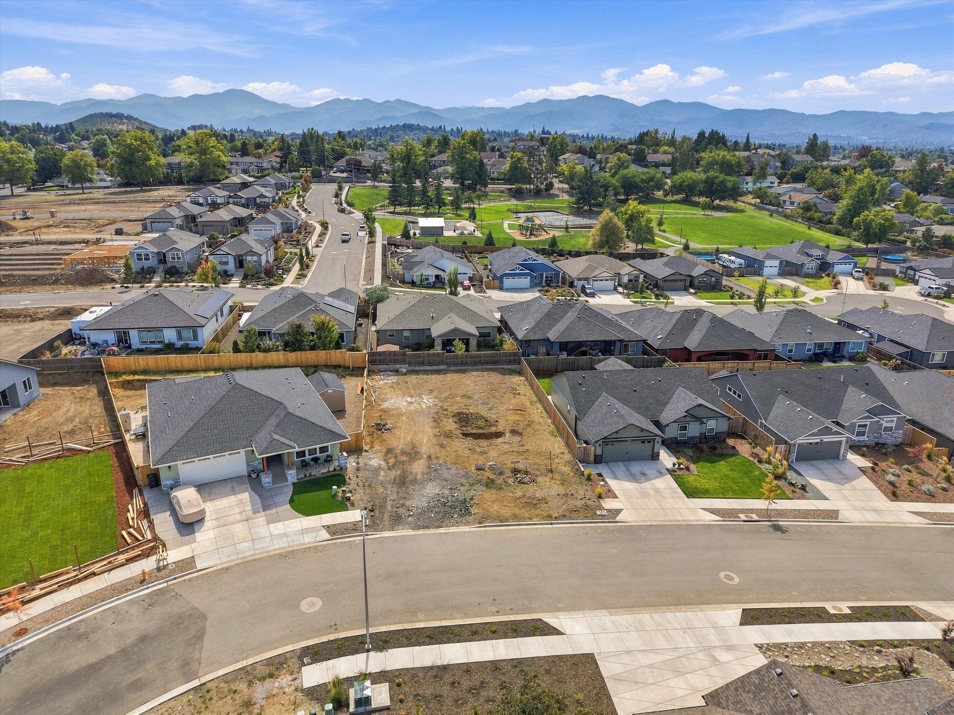 Aerial of Cascade Terrace with the Rogue Valley mountains beyond